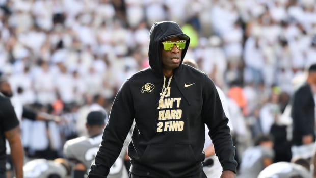 Colorado Buffaloes head coach Deion Sanders walks the field during game agains the USC Trojans at Folsom Field